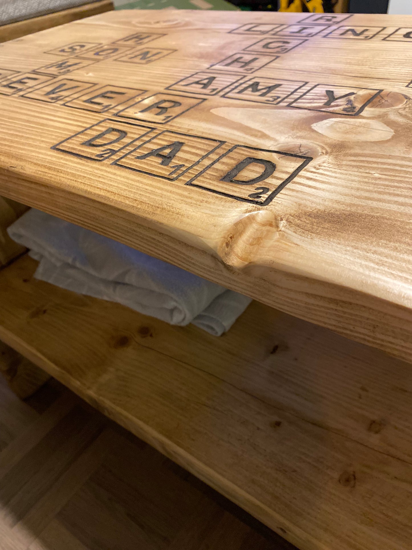 Freehand Routed Coffee Table: Reclaimed Scaffold Boards with Scrabble-Inspired Design