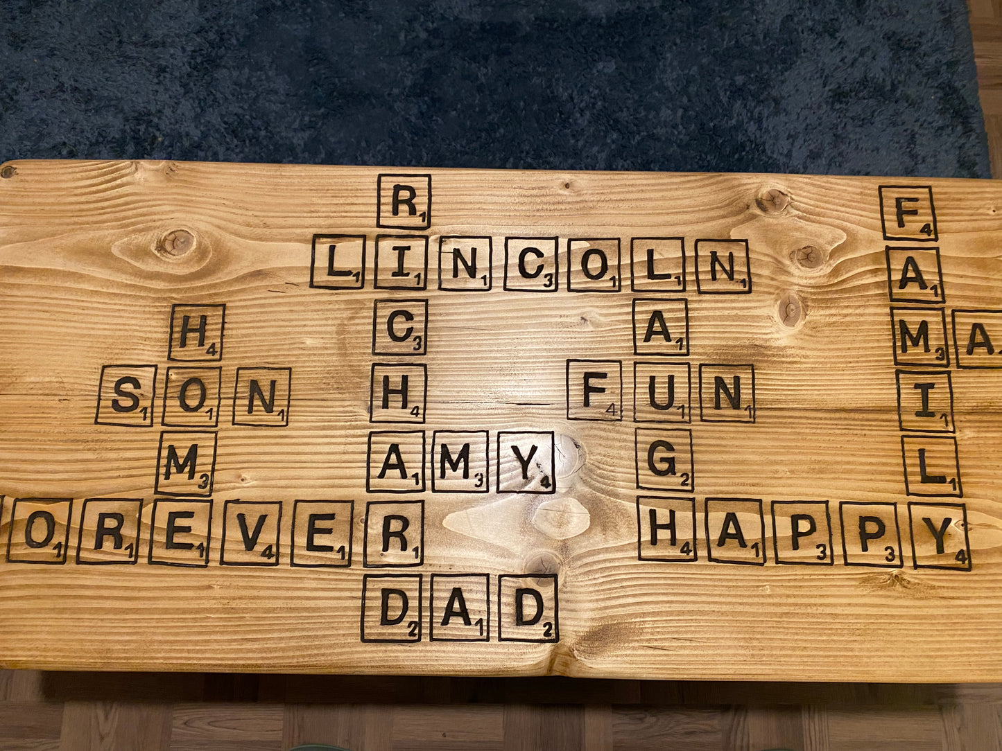 Freehand Routed Coffee Table: Reclaimed Scaffold Boards with Scrabble-Inspired Design