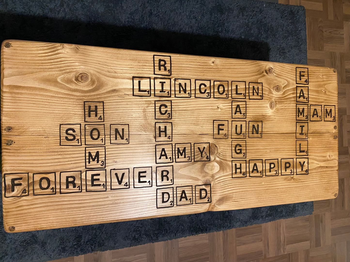 Freehand Routed Coffee Table: Reclaimed Scaffold Boards with Scrabble-Inspired Design